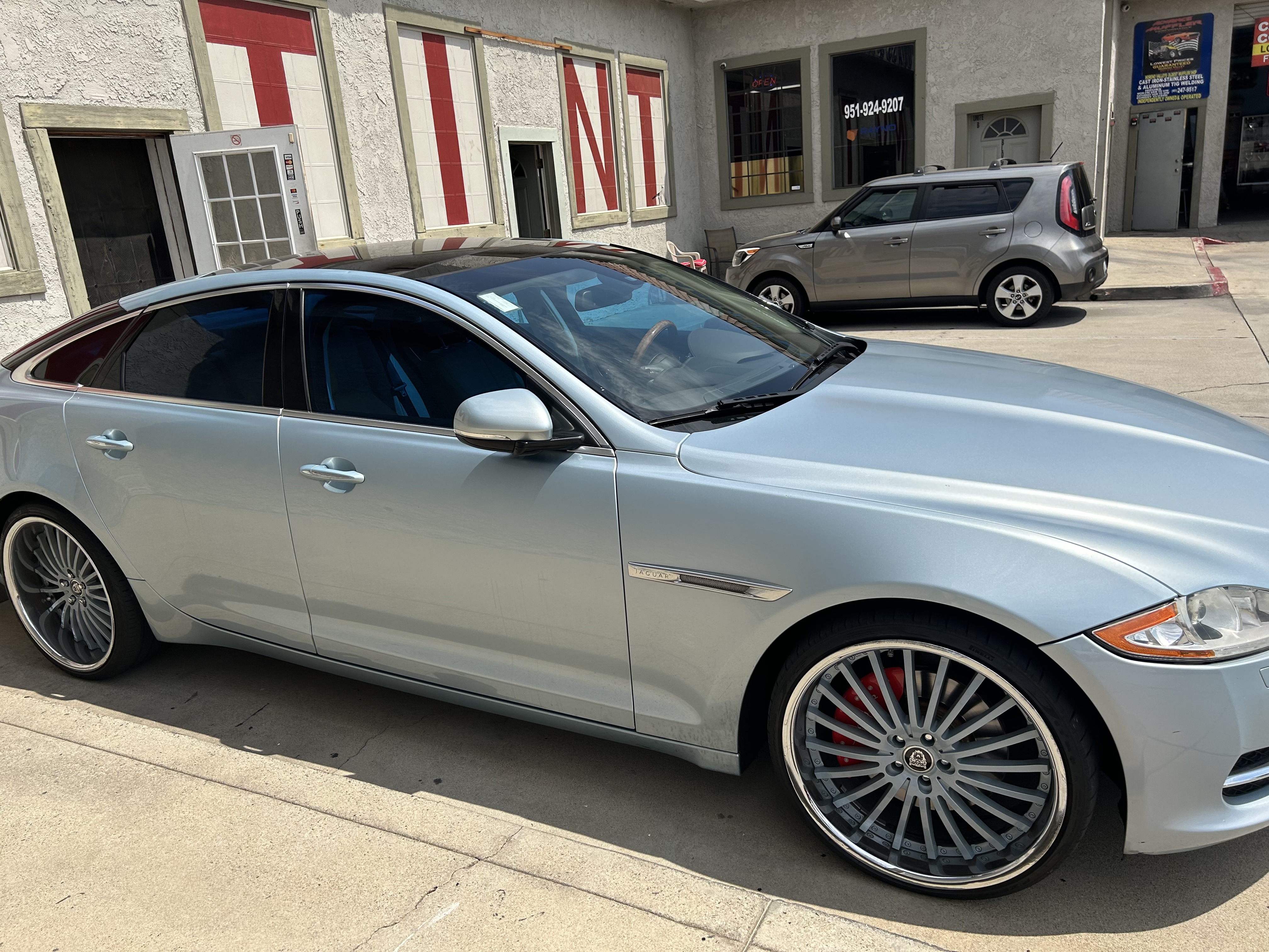 Silver Jaguar XJ with fresh window tint